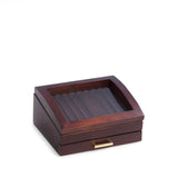 Made of solid walnut wood, this 19 pen display and storage box features a glass see-thru top and a second level drawer for additional storage of your fine writing instruments. Walnut Wood 19 Pen Box with Glass See-thru Top, Drawer and Gold Accents.