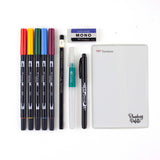 Learn to use Tombow Dual Brush Pens to easily create watercolor art with the Tombow Watercolor Set. Includes a pamphlet with helpful tips and all the tools you need to start blending and mixing colors. Each set includes 5 Dual Brush Pens, Medium Water Brush, MONO Drawing Pencil, MONO Twin Permanent Marker, MONO Plastic Eraser, Blending Palette, Watercolor Guide, and Mixing Chart. Dual Brush Pen Colors Included: 885 Warm Red, 993 Chrome Orange, 249 Hunter Green, 526 True Blue, 757 Port Red.