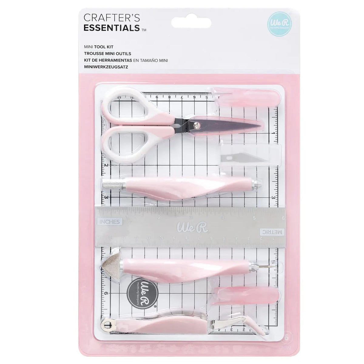 The We R Makers Mini Tool Kit in Pink is the ultimate companion for all your DIY craft projects. This comprehensive kit includes essential tools: a cutting mat, ruler, scissors, craft knife, tweezers, brad setter, and piercing tool. Designed for versatility, it's perfect for scrapbooking, journaling, card making, and a wide range of other crafts.

The vibrant pink color adds a fun and stylish touch to your toolkit, while the high-quality construction ensures each tool is durable and reliable. The cutting ma