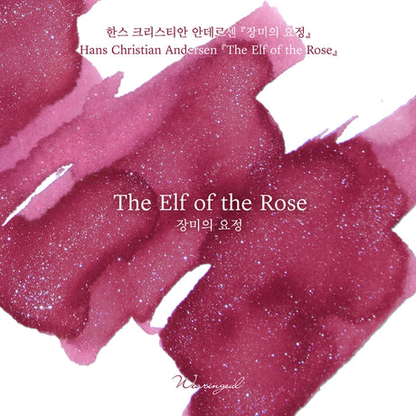 A warm raspberry rose base is accented with cool silver and blue glitter that softly sparkles through the surface, capturing both the beauty and tragedy of human love as seen through the eyes of a fairy.