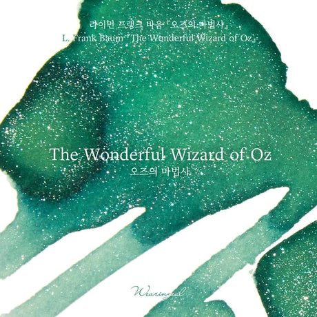 A vivid emerald green is infused with mysterious silver and blue shimmer, weaving through the surface with an ethereal glow and capturing the fantastical journey toward the Emerald City.