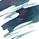 A cold teal greenish blue reminiscent of deep sleep is veiled with muted violet that softly blooms across the surface, capturing the love first encountered by Undine, a being once born of water, and the quiet tragedy that followed in its wake.