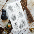  Step into @vonnart’s spellbound woodland, where stars glitter overhead and the forest keeps its secrets well. A crowned figure cloaked in bones, towering mushrooms, witchy alchemy, and an otherworldly stag emerge like fragments of a dark fairytale. Haunting, whimsical, and beautifully imaginative, it will bring a touch of forest magic to your pages.

Art by: @vonnart

One sticker sheet is included.
Top Coating: Silver foil
Adhesive Layer: Paper
Backing Layer: Paper
Size: 6.69"x3.54"
Weight-0.03oz
