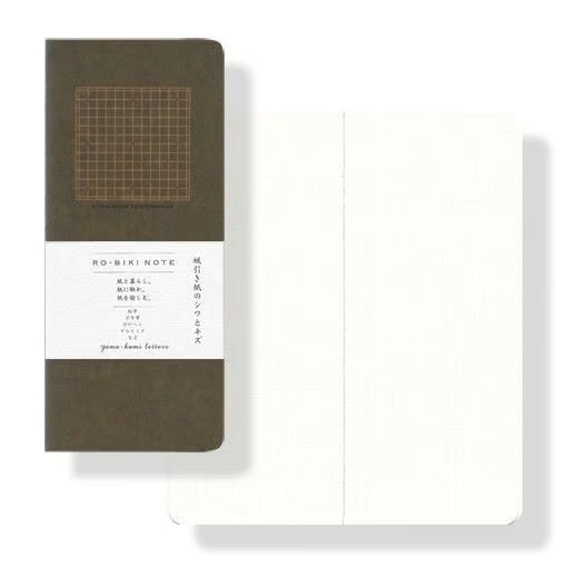 The RO‑BIKI Note is a beautifully crafted Japanese notebook known for its distinctive waxed paper cover, which gains character the more you use it. Over time, the cover softens, develops a natural patina, and becomes uniquely yours—making every notebook feel personal and well‑loved.

Inside, you’ll find high‑quality 4.5mm Reticle Squared paper ideal for writing, sketching, planning, or journaling. Its compact size makes it perfect for everyday carry, while the durable construction ensures it holds up to fre