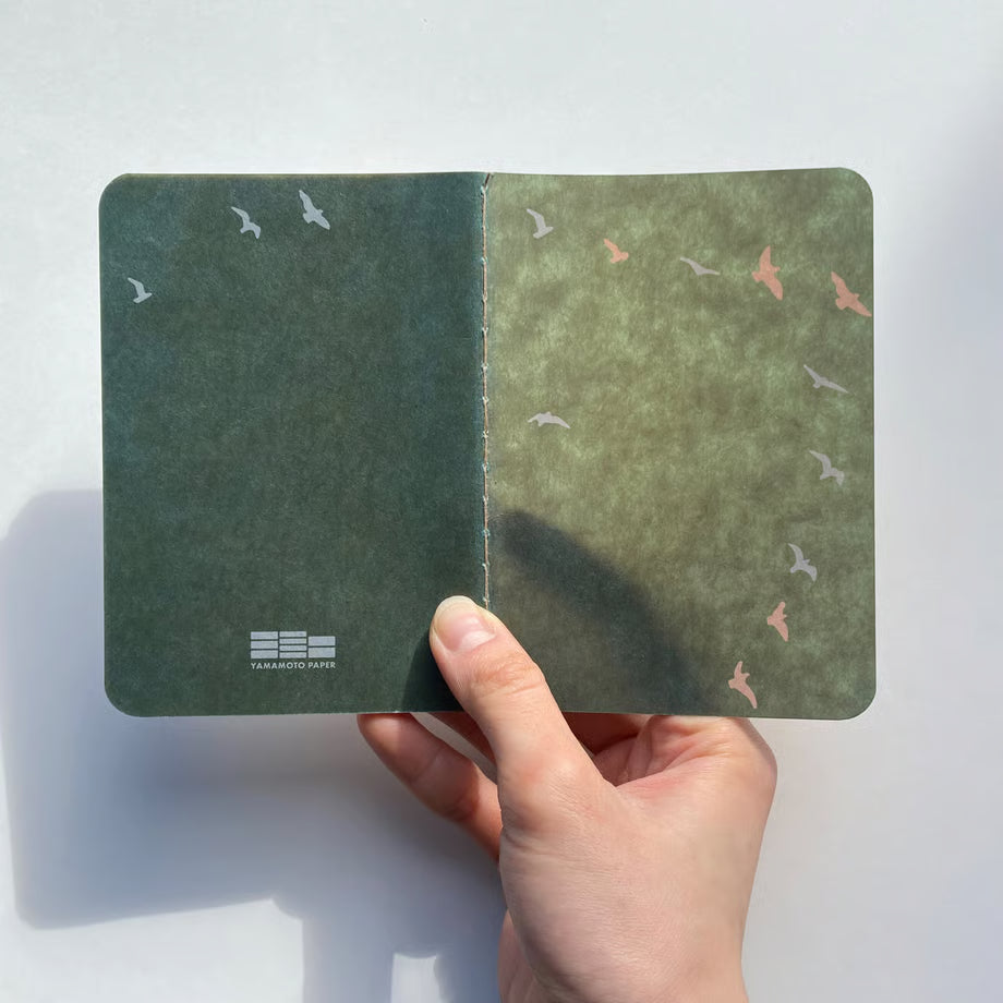 The RO‑BIKI Note is a beautifully crafted Japanese notebook known for its distinctive waxed paper cover, which gains character the more you use it. Over time, the cover softens, develops a natural patina, and becomes uniquely yours—making every notebook feel personal and well‑loved.