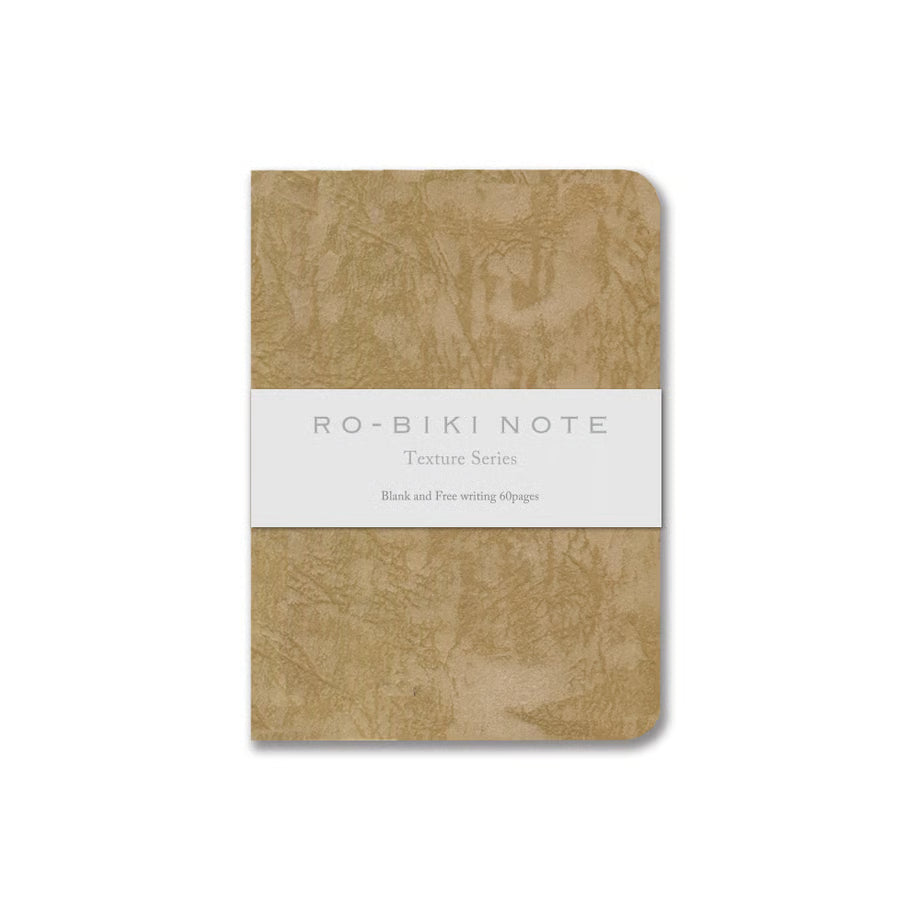 The RO‑BIKI Note is a beautifully crafted Japanese notebook known for its distinctive waxed paper cover, which gains character the more you use it. Over time, the cover softens, develops a natural patina, and becomes uniquely yours—making every notebook feel personal and well‑loved.