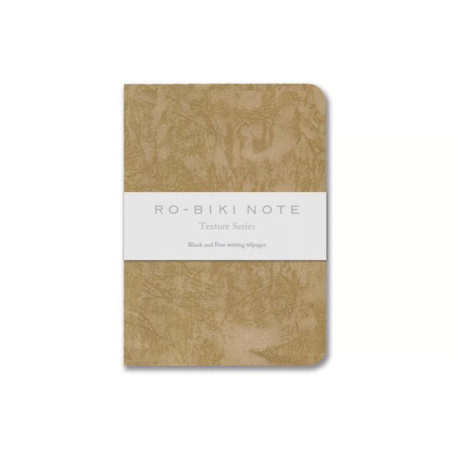The RO‑BIKI Note is a beautifully crafted Japanese notebook known for its distinctive waxed paper cover, which gains character the more you use it. Over time, the cover softens, develops a natural patina, and becomes uniquely yours—making every notebook feel personal and well‑loved.