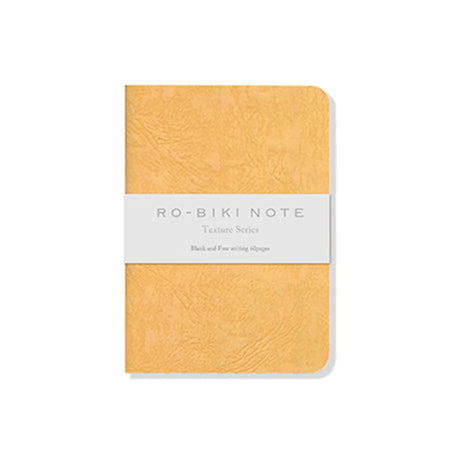 The RO‑BIKI Note is a beautifully crafted Japanese notebook known for its distinctive waxed paper cover, which gains character the more you use it. Over time, the cover softens, develops a natural patina, and becomes uniquely yours—making every notebook feel personal and well‑loved.
