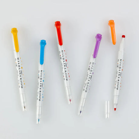 Unleash your creativity with the latest addition to the MILDLINER family! Featuring MILDLINER ink colors, the new Dual-Tip Dot and Stamp Markers offer a dot or stamp on one end and fine bullet tip on the feature soft, pastel MILDLINER colors that add a personal touch to any project. One end is equipped with fun, versatile stamps—choose between dots or unique shapes—while the other side boasts the classic bullet tip you know and love. 