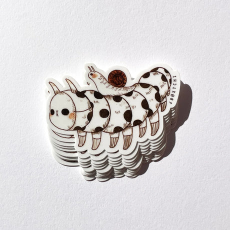 The caterpillar vinyl sticker was illustrated by jb0xtchi (Jessica Ng). jb0xtchi creates stationary and small trinkets from whimsical ideas in the form of painting using ink, watercolour, and gouache.