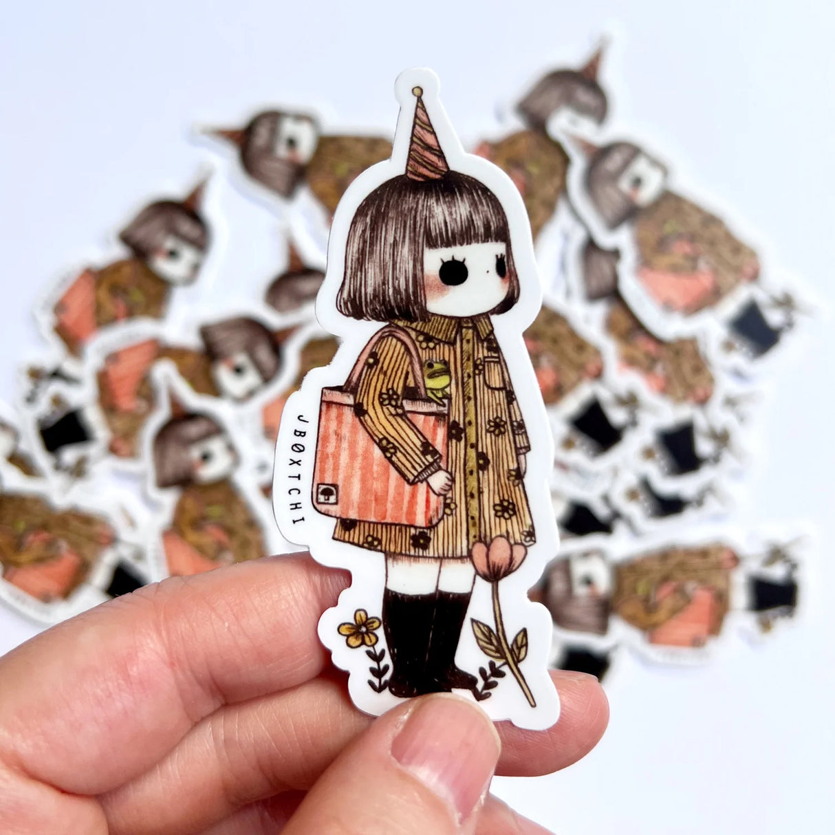 jb0xtchi Vinyl Sticker - Little Girl

The little girl vinyl sticker was illustrated by jb0xtchi (Jessica Ng). jb0xtchi creates stationary and small trinkets from whimsical ideas in the form of painting using ink, watercolour, and gouache.