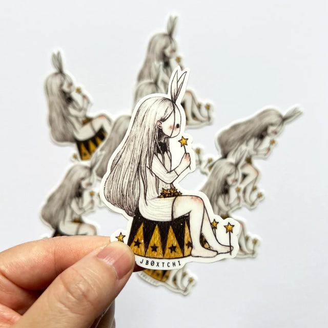jb0xtchi Vinyl Sticker - Starry Girl

The starry girl vinyl sticker was illustrated by jb0xtchi (Jessica Ng). jb0xtchi creates stationary and small trinkets from whimsical ideas in the form of painting using ink, watercolour, and gouache.