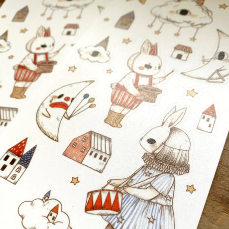 This whimsical themed washi sticker sheet was illustrated by jb0xtchi (Jessica Ng). jb0xtchi creates stationary and small trinkets from whimsical ideas in the form of painting using ink, watercolour, and gouache.

Washi Material Sticker Sheet
Height: 170mm x Width: 90mm
Includes 1 sticker sheet