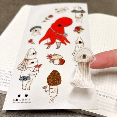 This whimsical themed washi sticker sheet was illustrated by jb0xtchi (Jessica Ng). jb0xtchi creates stationary and small trinkets from whimsical ideas in the form of painting using ink, watercolour, and gouache.

Washi Material Sticker Sheet
Height: 170mm x Width: 90mm
Includes 1 sticker sheet