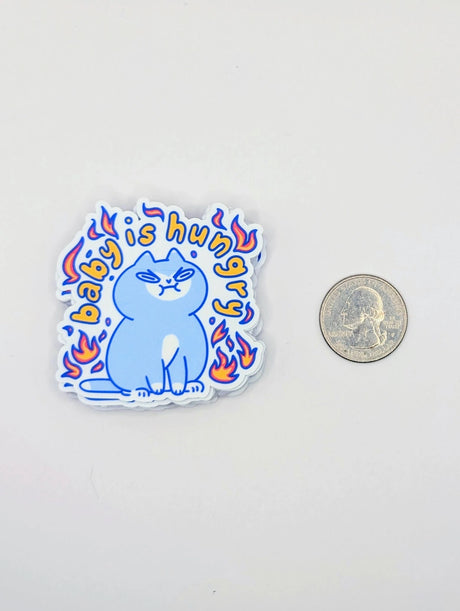 Perfect for those who understand the power of a hangry kitty, this 2" sticker features an adorably angry cat surrounded by vibrant flames. Made from durable, waterproof vinyl, this sticker is built to withstand the elements—whether you stick it on your water bottle, laptop, or anywhere else you want to show off your sassy side. Add a touch of attitude and humor to your collection with this cute yet fiery design!