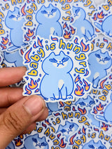 Perfect for those who understand the power of a hangry kitty, this 2" sticker features an adorably angry cat surrounded by vibrant flames. Made from durable, waterproof vinyl, this sticker is built to withstand the elements—whether you stick it on your water bottle, laptop, or anywhere else you want to show off your sassy side. Add a touch of attitude and humor to your collection with this cute yet fiery design!