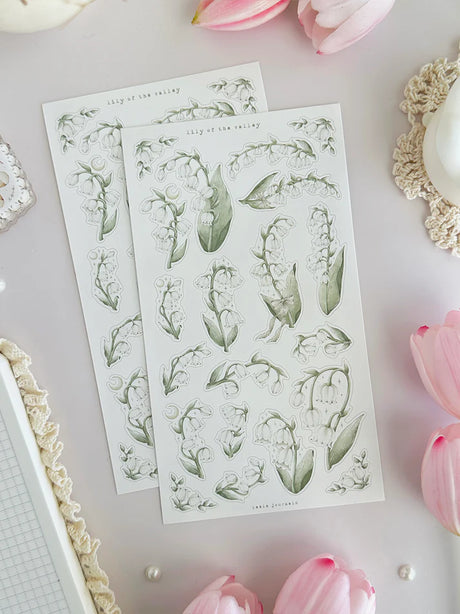 leelajournals Lily of the Valley &amp; Frames 1 Sticker Sheet - 2 pc Set

♡ 2pc sticker sheet set - 2 large

♡ pet matte (clear)

♡ all sheet dimensions estimated: L: 4x7 (in) | S: 4x3 (in)