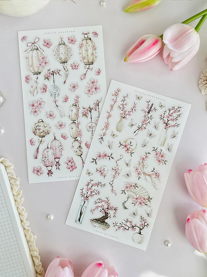 leelajournals Sakura &amp; Lanterns Sticker Sheet - 2 pc Set

♡2pc sticker sheet set - 2 large&nbsp;

♡ pet matte (clear)

♡ all sheet dimensions estimated: L: 4x7 (in) | S: 4x3 (in)