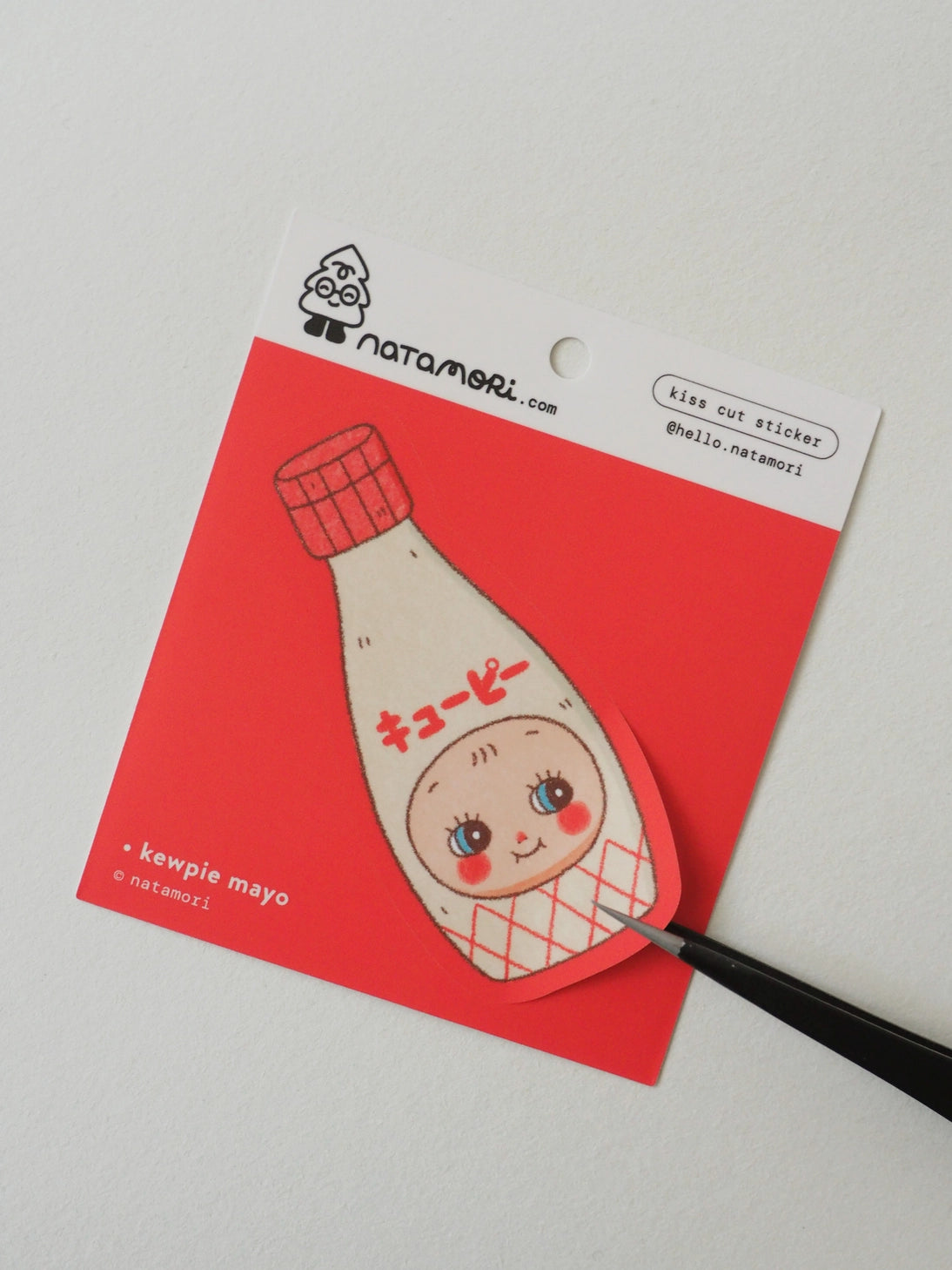Kewpie Mayo Vinyl Sticker by natamori

✿ approx. 7.5 × 3.5 cm
✿ on a 3" × 3.5" sheet, easy to peel and stick
✿ matte vinyl sticker
✿ water- and scratch-resistant