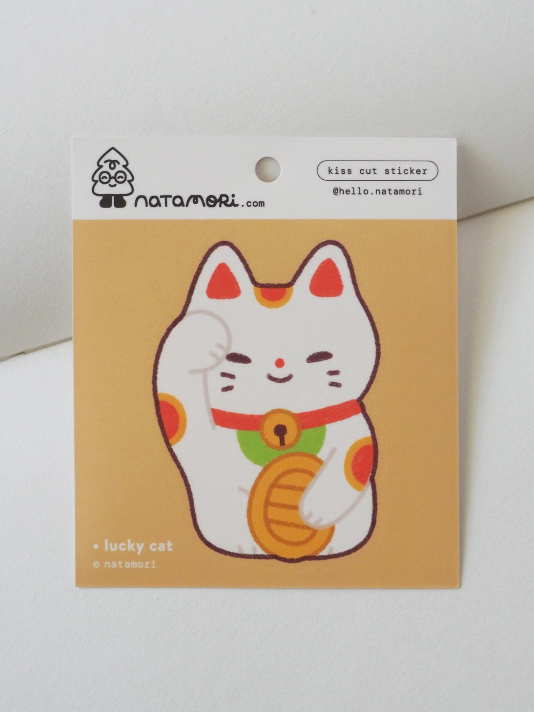 Lucky Cat Vinyl Sticker by natamori

✿ approx. 4.5 × 6.5 cm
✿ on a 3" × 3.5" sheet, easy to peel and stick
✿ matte vinyl sticker
✿ water- and scratch-resistant