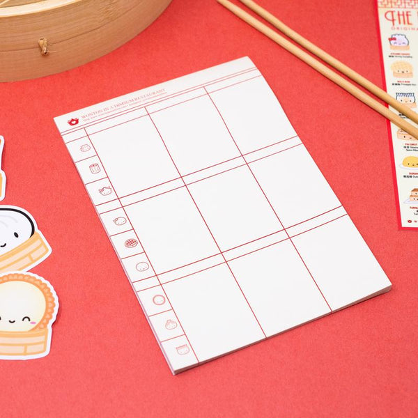 Take notes of things or make lists with this jumbo 5x7" Dumpling Day notepad with the design of a dimsum check!
