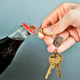 Key Bottle Opener. Unlock the good times. Stainless steel key shaped bottle opener. Attaches to your key-ring. Compact and easy to carry. An incredibly useful gift.