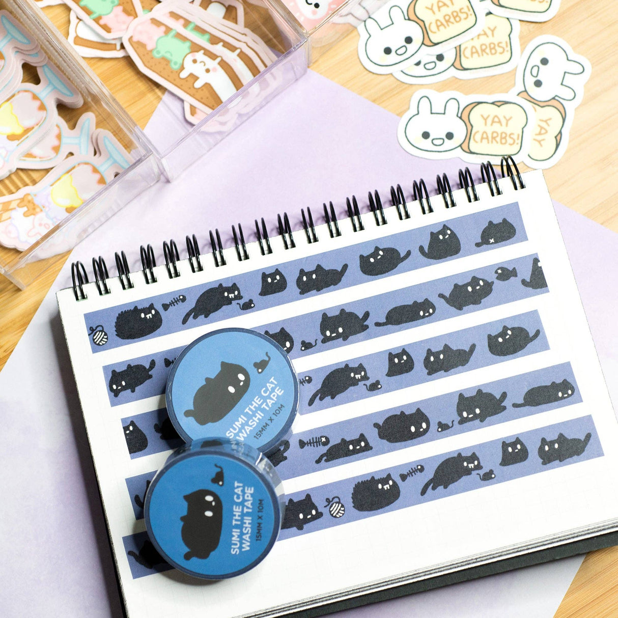 Sumi the cat is a black cat born out of charcoal dust. Use this washi tape on your notebooks or scrapbooks or however else you'd like to use it!
