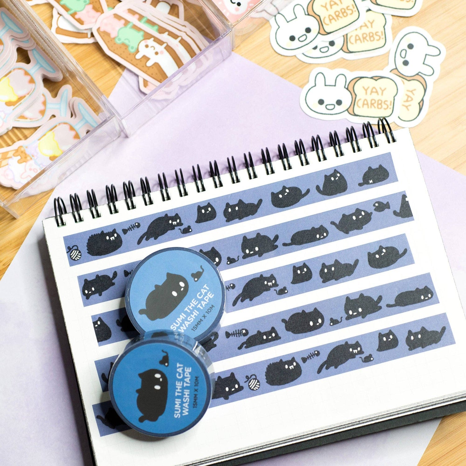 Sumi the cat is a black cat born out of charcoal dust. Use this washi tape on your notebooks or scrapbooks or however else you'd like to use it!