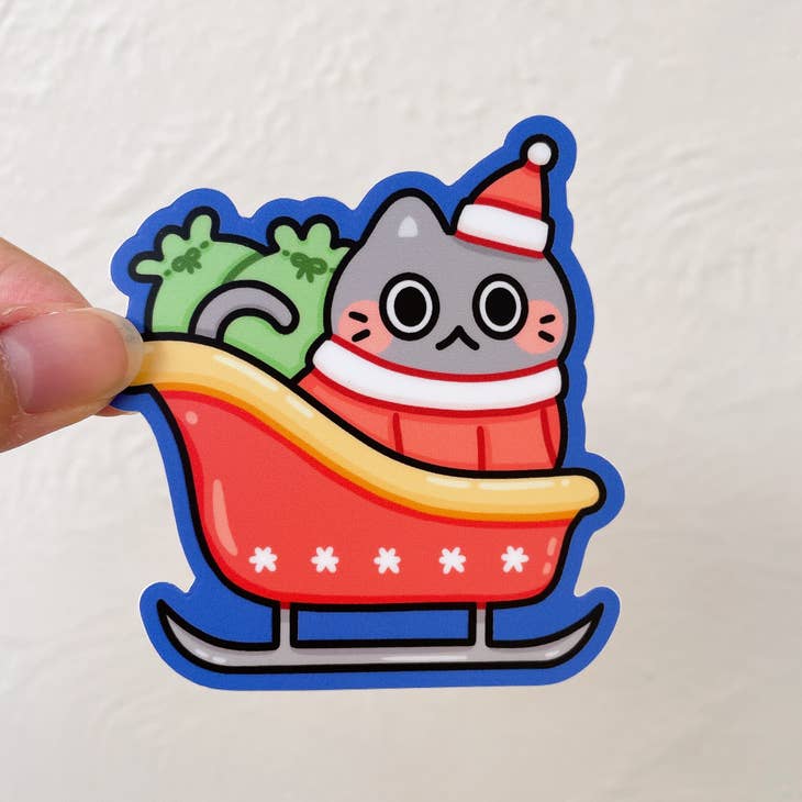 Pegatina de vinilo del gato del trineo de Papá Noel