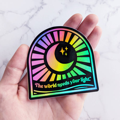 Holographic Sun & Moon Sticker • The World Needs Your Light